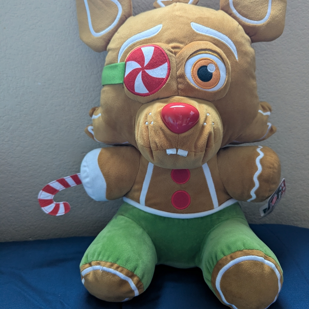 Brown and Green Stuffed Animal Toy